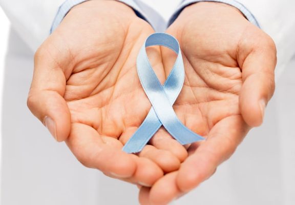 Prostate-awareness-hands-with-ribbon